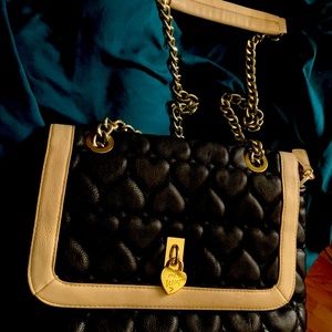 Betsey Johnson bag with hearts. Perfect condition and has pockets.